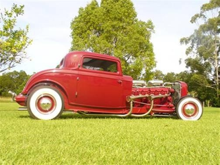 Illustration for article titled Aussie Nutjobs Drop GMC Twin-Six V12 In Fiberglass Hot Rod